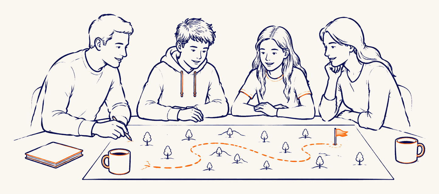A parent and three young people gathered around a table, mapping out a path together toward a flag