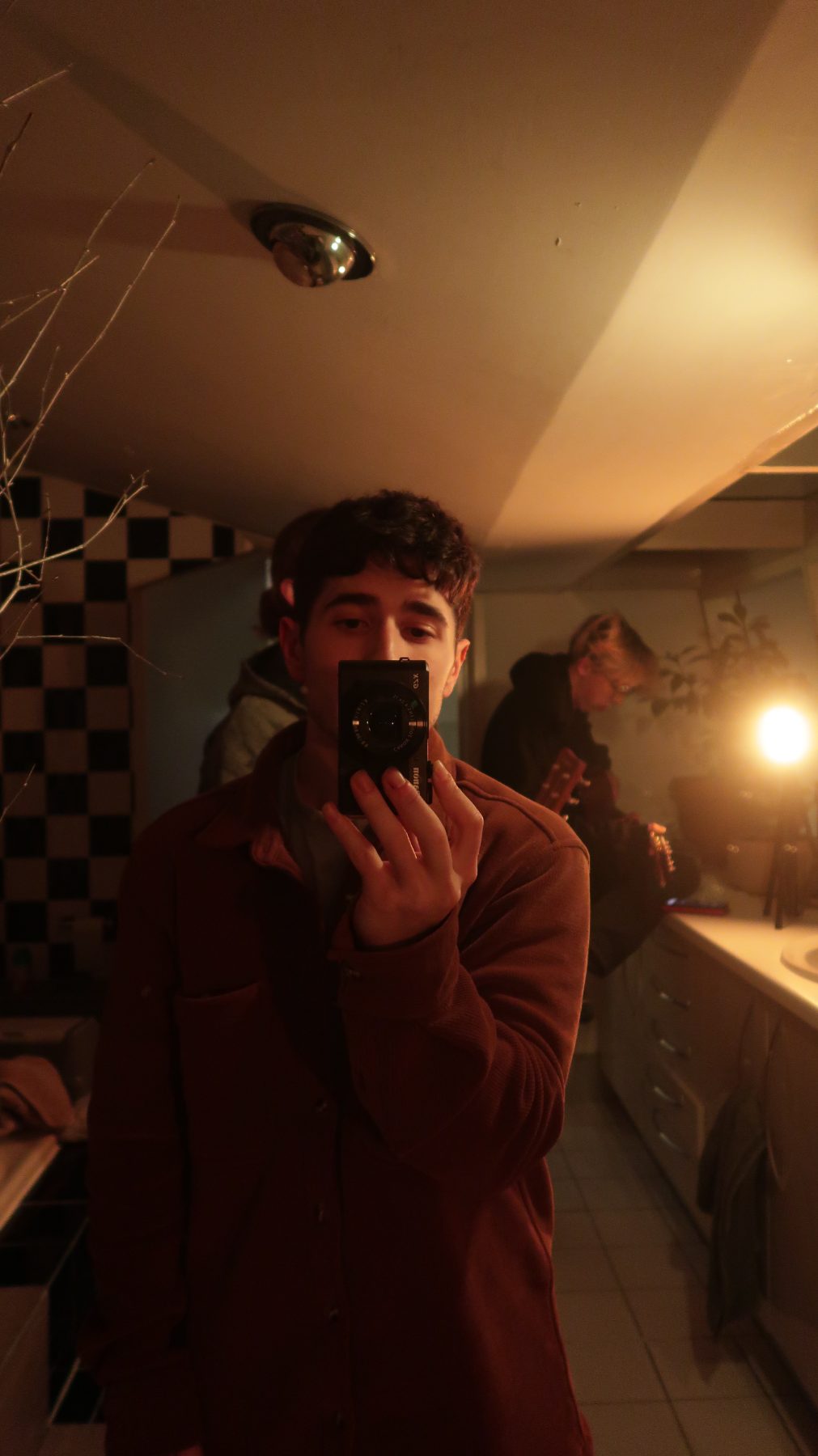 Nick Luna Ferreira holding a camera
